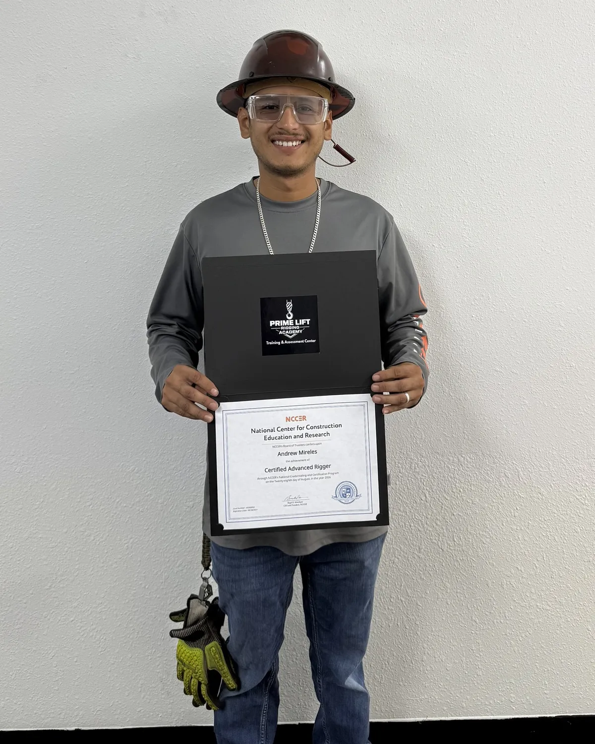 Andrew M. with his NCCER Certified Advanced Rigger certificate