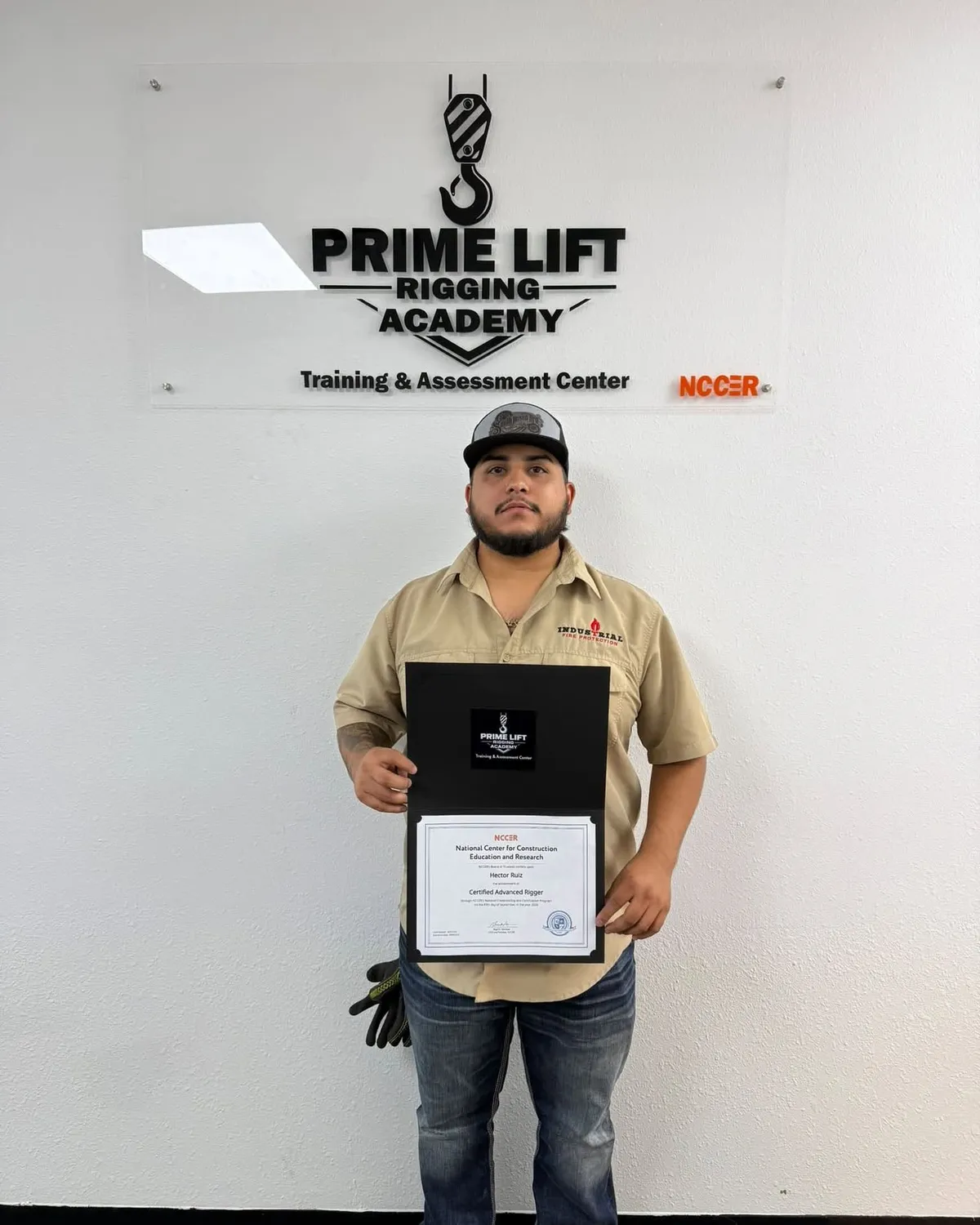 Hector R. with his NCCER Certified Advanced Rigger certificate