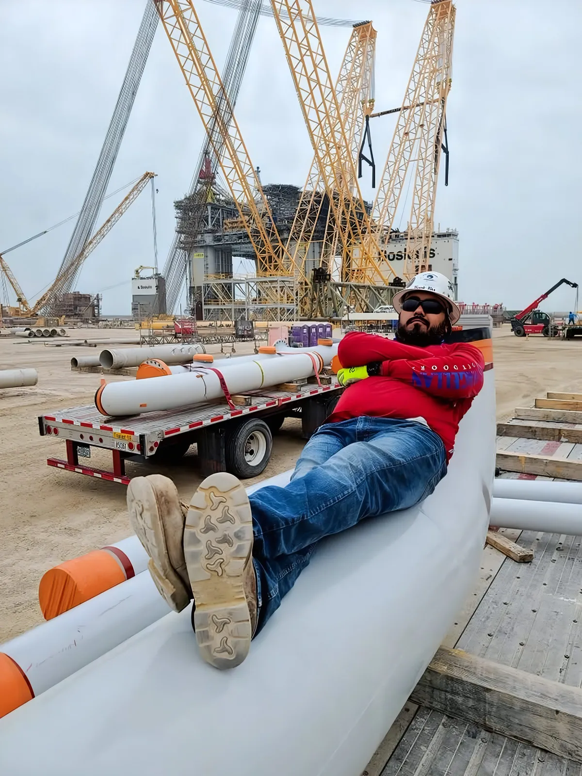 Frank Torres at a heavy lift jobsite with crawler cranes